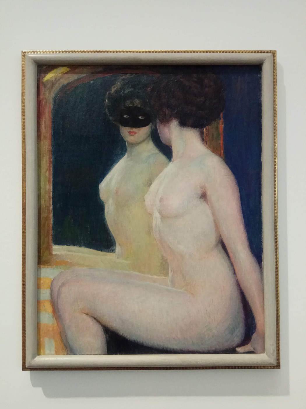Female nude in front of mirror